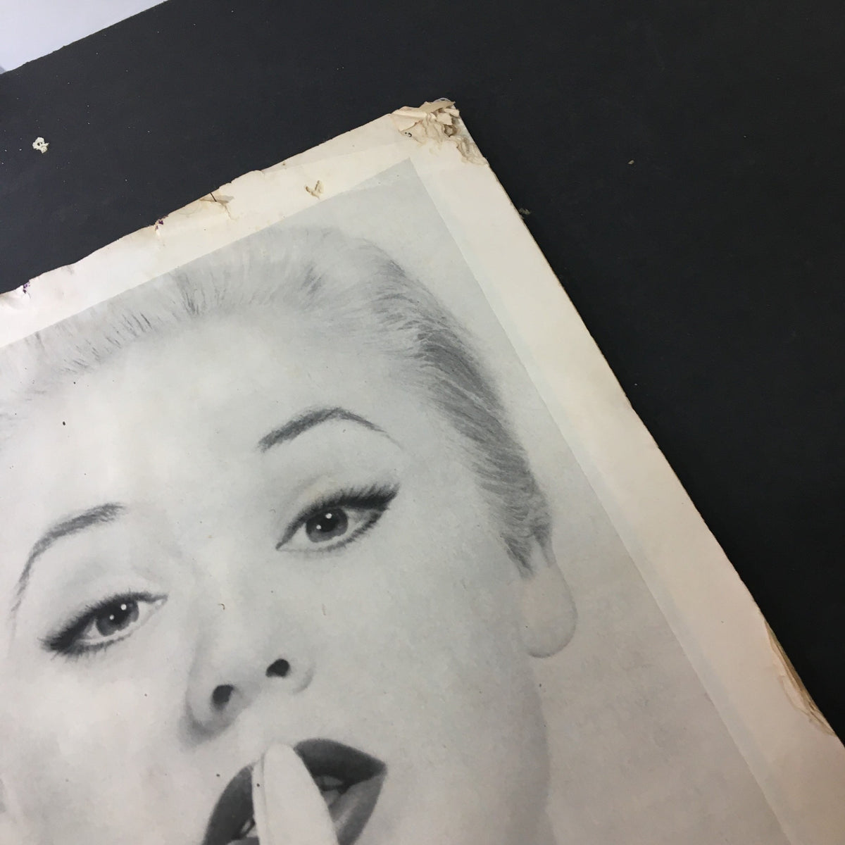 Another inside page of the July 1957 VTG Journal Magazine featuring an advertisement with a glamorous model promoting beauty products.