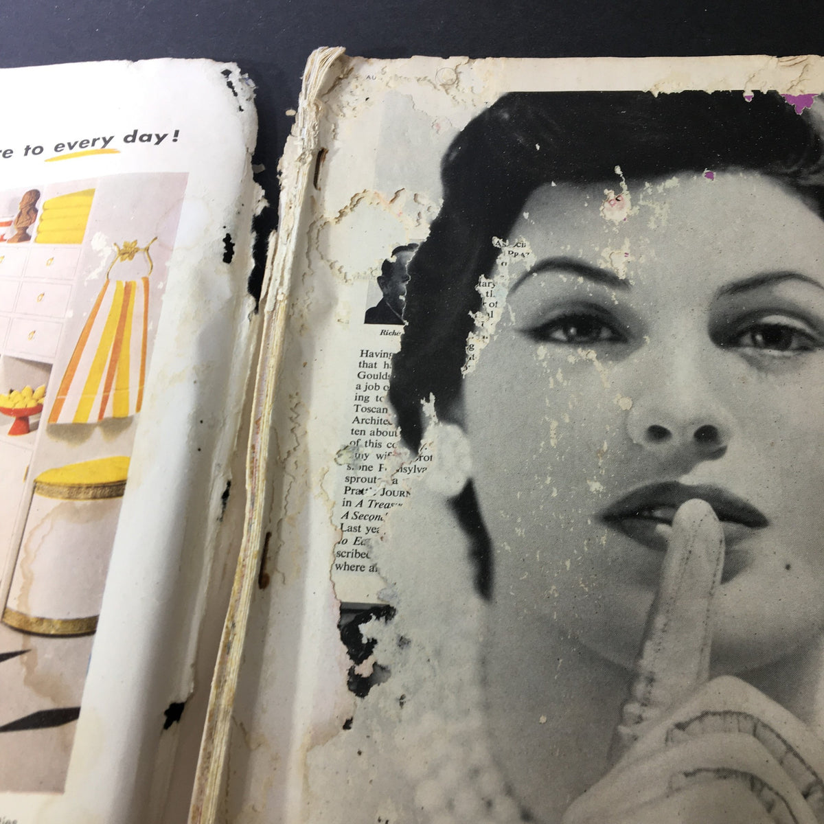 Interior view of the VTG Journal Magazine August 1957, featuring a vintage black and white photograph of a woman, showing notable page damage, which highlights the magazine's history.