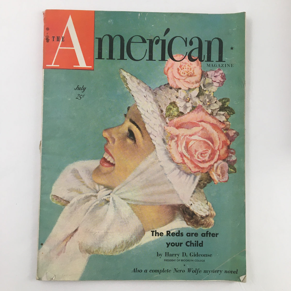 Cover of The American Magazine July 1948 featuring a smiling woman in a floral hat, highlighting the cover story 'The Reds are after your Child'.