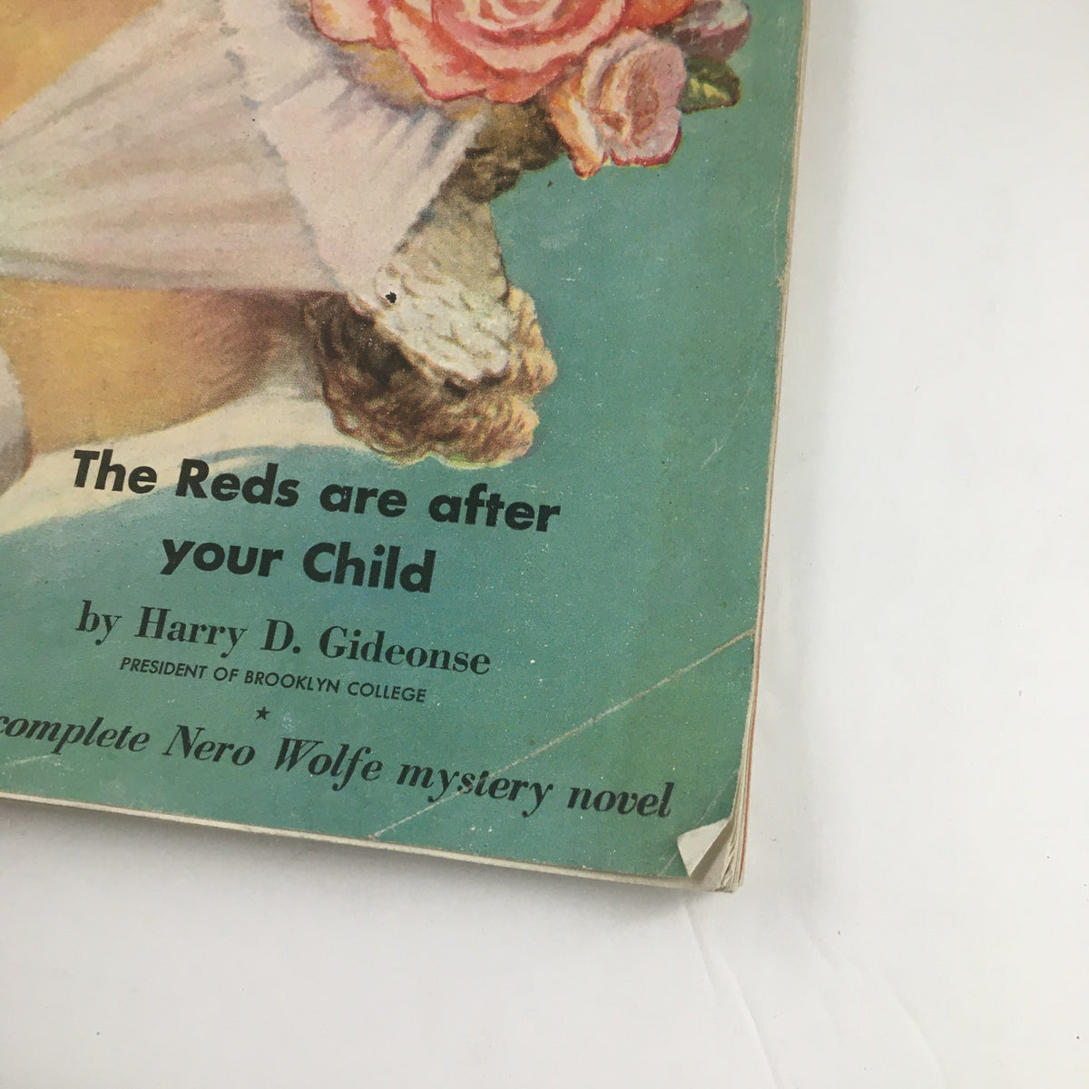 Detailed view of The American Magazine July 1948 cover showcasing the text 'The Reds are after your Child' by Harry D. Gideonse.