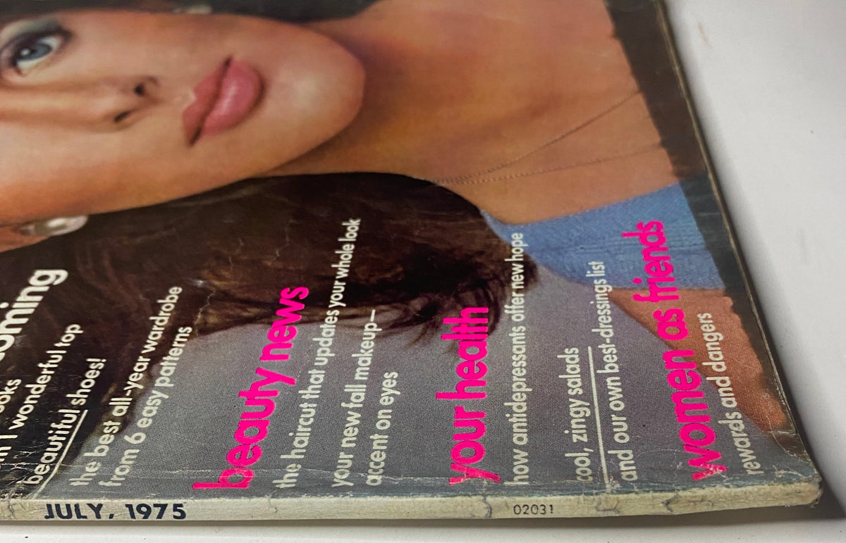Back cover image of Vogue Magazine July 1975 detailing beauty news and features, showcasing Rene Russo's impactful presence.