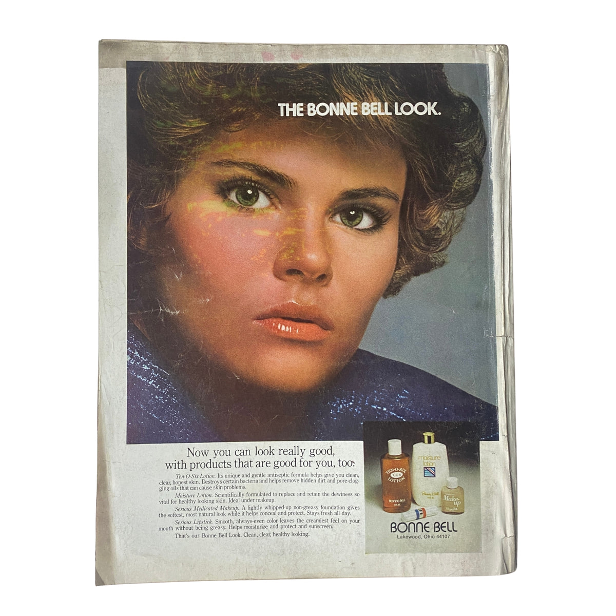 Advertisement page for Bonne Bell products in Vogue Magazine July 1975, featuring a model with glowing skin and bold makeup styles, promoting beauty innovations of the era.