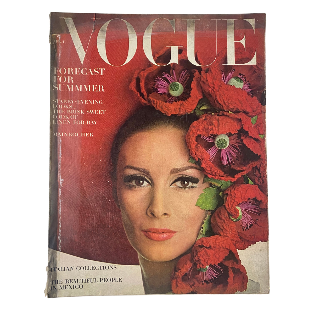 Vogue Magazine April 1, 1965 featuring Wilhelmina Cooper on the cover, adorned with bold red flowers, showcasing mid-1960s fashion elegance.
