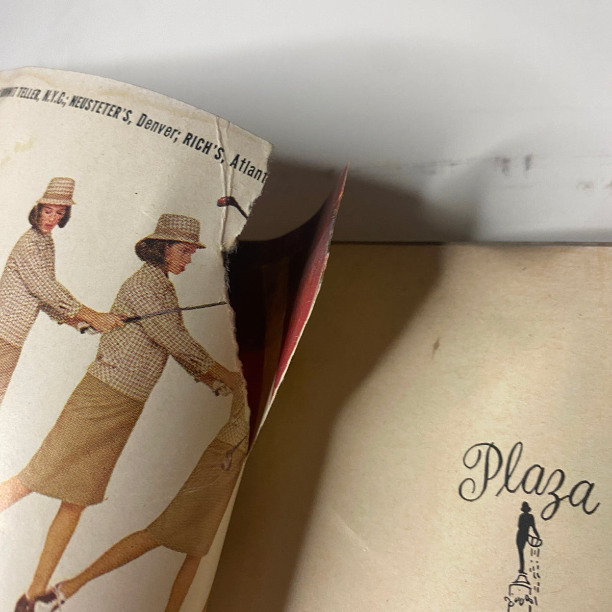 Interior view of Vogue Magazine April 1, 1965, revealing the quality of the pages and a glimpse of mid-century fashion and advertisements.