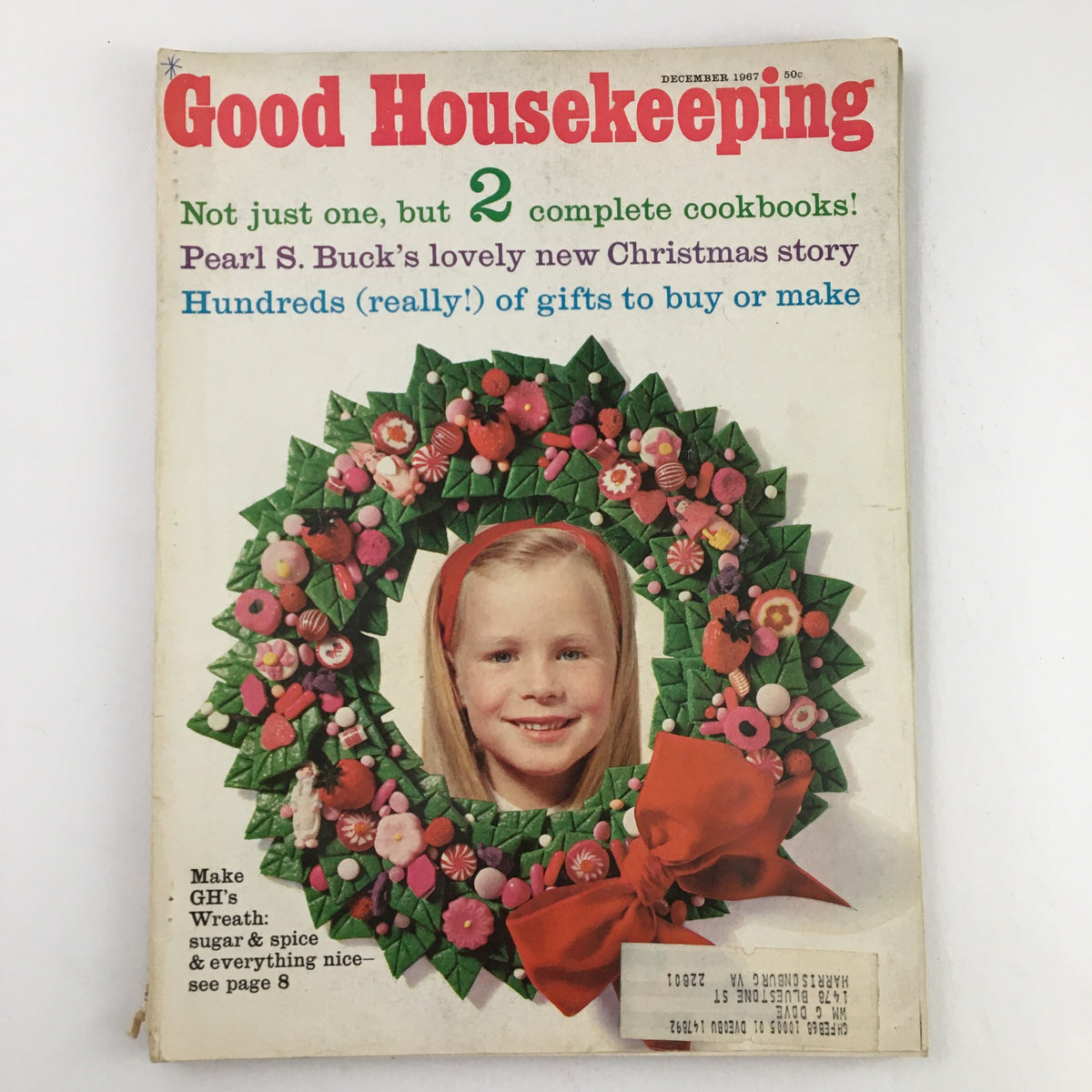 Cover of Good Housekeeping Magazine December 1967 featuring a holiday wreath made of decorative items with a young girl smiling inside the wreath. The issue includes articles on creating festive decorations, including GH's Wreath with Sugar and Spice.