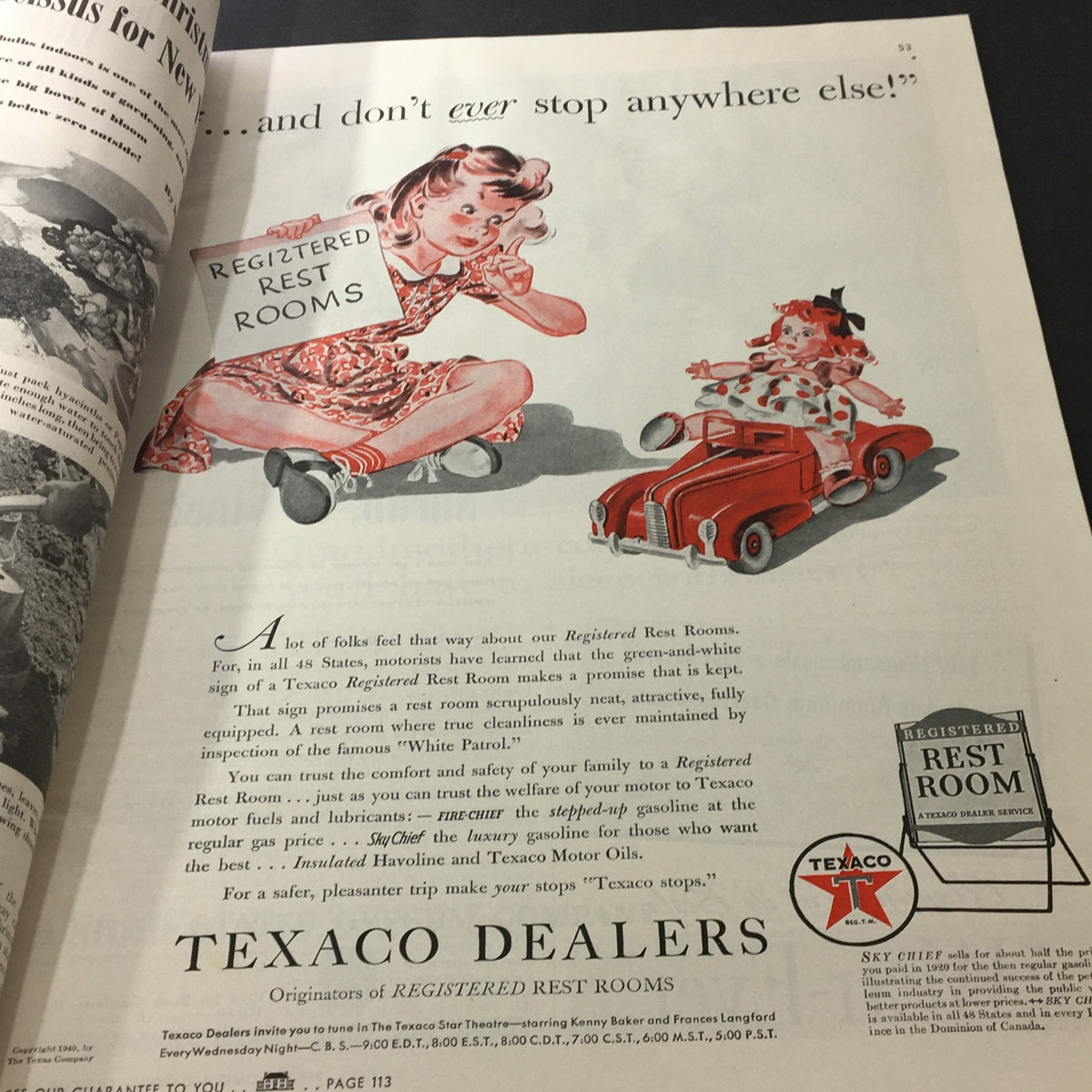 Advertisement from Better Homes & Gardens October 1940, featuring a cheerful girl with a toy car promoting Texaco Registered Rest Rooms. The illustration highlights family-friendly amenities on road trips.