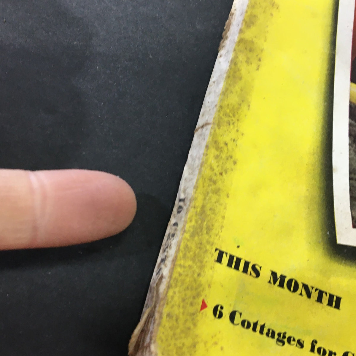 Detailed view of the bottom edge of the VTG Better Homes & Gardens April 1941 Flower Arranging Made Easy magazine, illustrating vintage wear.