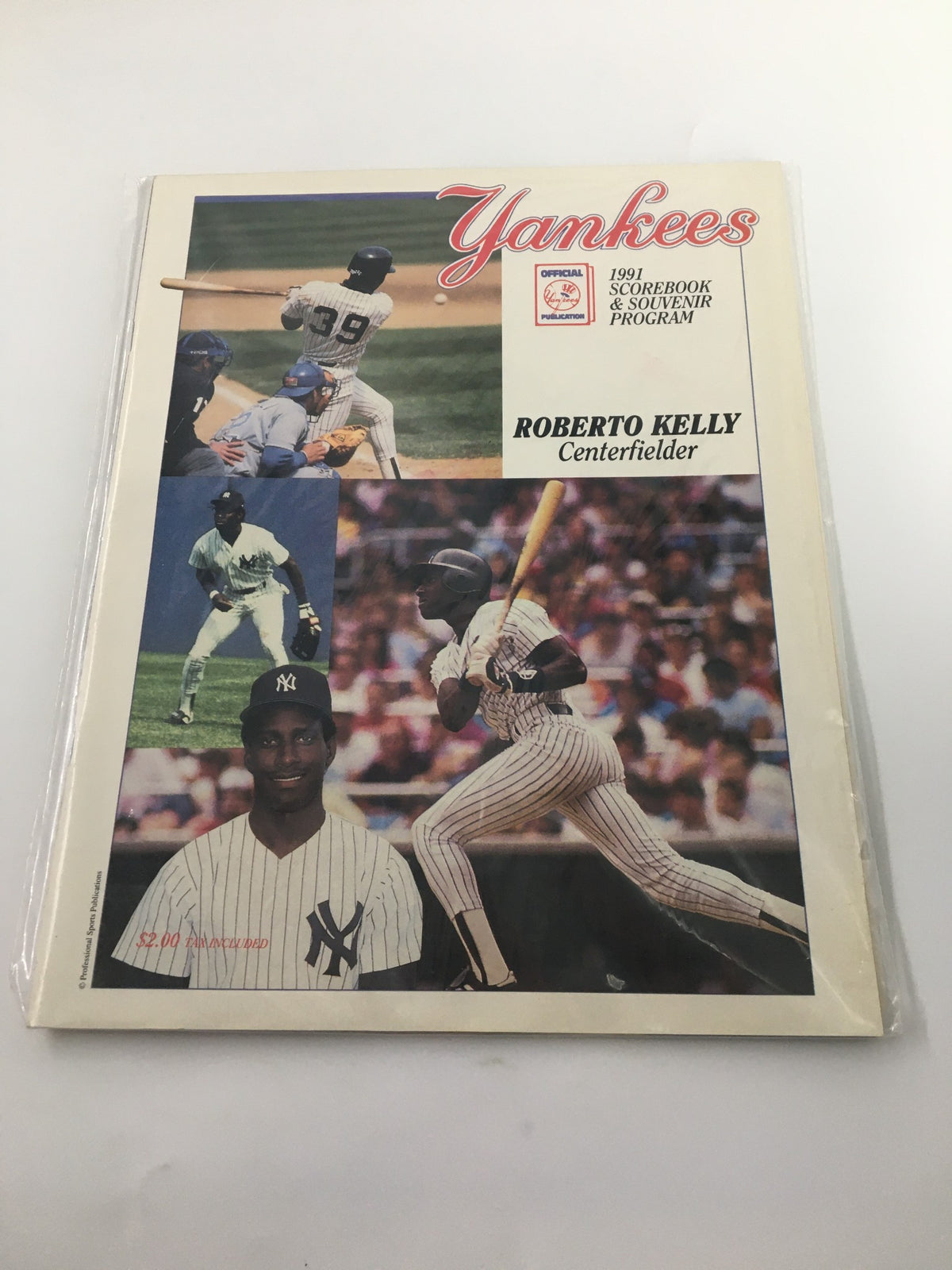 Front cover view of the 1991 Official Scorebook & Souvenir Program MLB New York Yankees, highlighting Roberto Kelly and stunning game imagery.