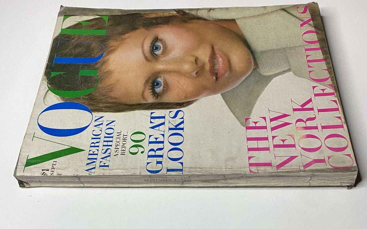 Side view of Vogue Magazine September 1, 1969 featuring Ulla Bomser, emphasizing the magazine's worn edges and vintage condition. Highlights American fashion focused on New York Collections.