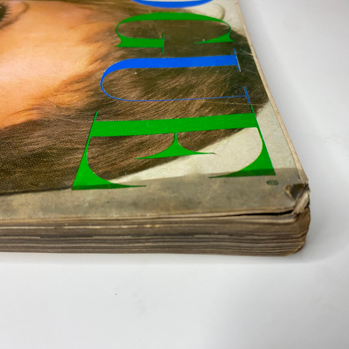 Detail shot of the vintage Vogue Magazine from September 1, 1969 featuring Ulla Bomser on the cover, showcasing the binding and edge wear typical of collectable magazines.