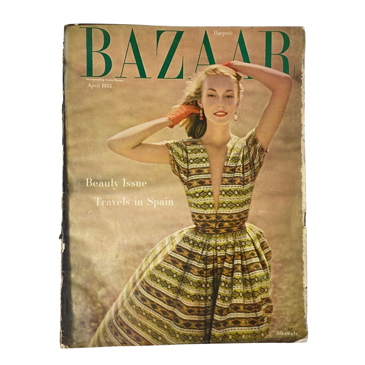 Harper's Bazaar Magazine April 1955 featuring Liz Pringle on the cover with a vibrant dress, showcasing spring fashion and beauty.