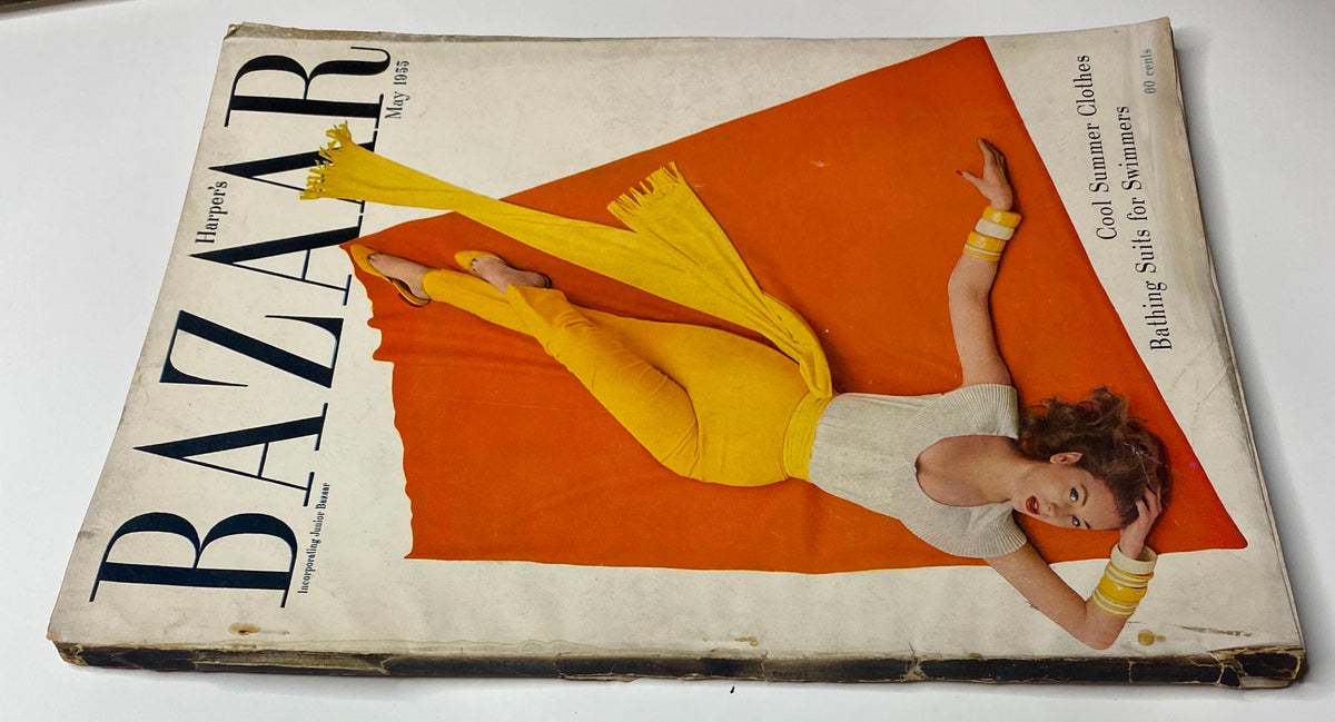 Cover of Harper's Bazaar Magazine May 1955 with model elegantly posed in yellow and white attire, highlighting summer clothing trends and bathing suits, photographed by Richard Avedon.