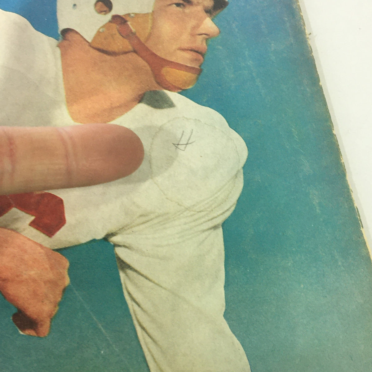 Close-up of VTG Sport Magazine November 1951 cover highlighting Bill McColl with a finger pointing at the details.