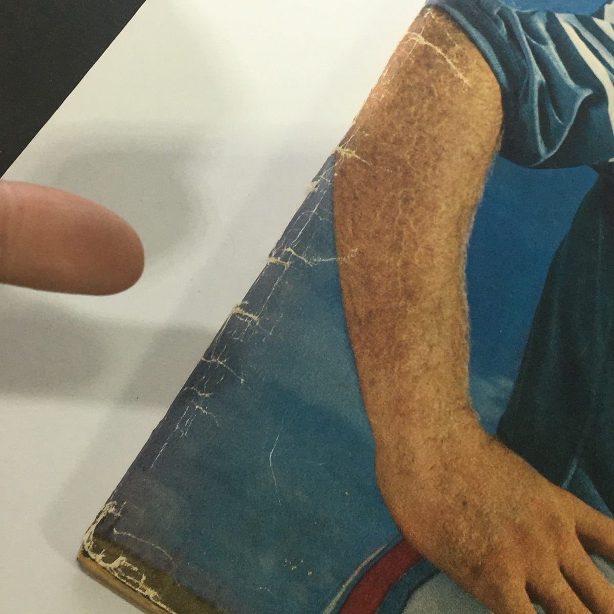 Side view of the Sports Illustrated Magazine August 17, 1964 showing the wear on the cover and edges, illustrating the magazine's authenticity as a vintage piece.