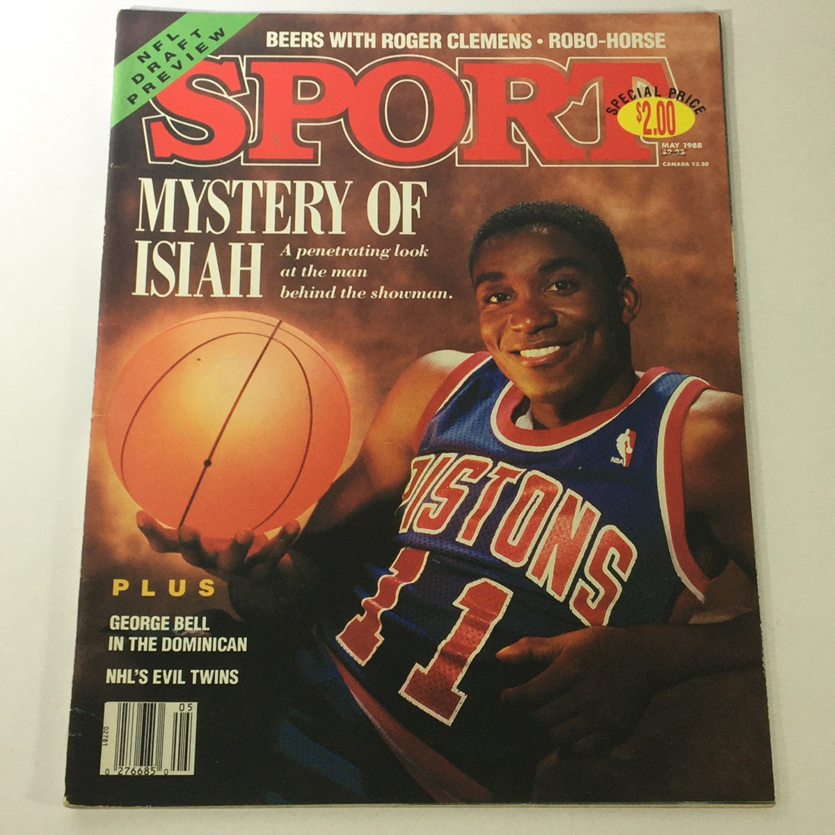 Cover of the VTG Sport Magazine May 1988 Vol 79 #5 featuring a prominent basketball player holding a basketball, highlighting the mystery of Isiah Thomas, with a focus on George Bell as well. Includes the magazine's price and special features.