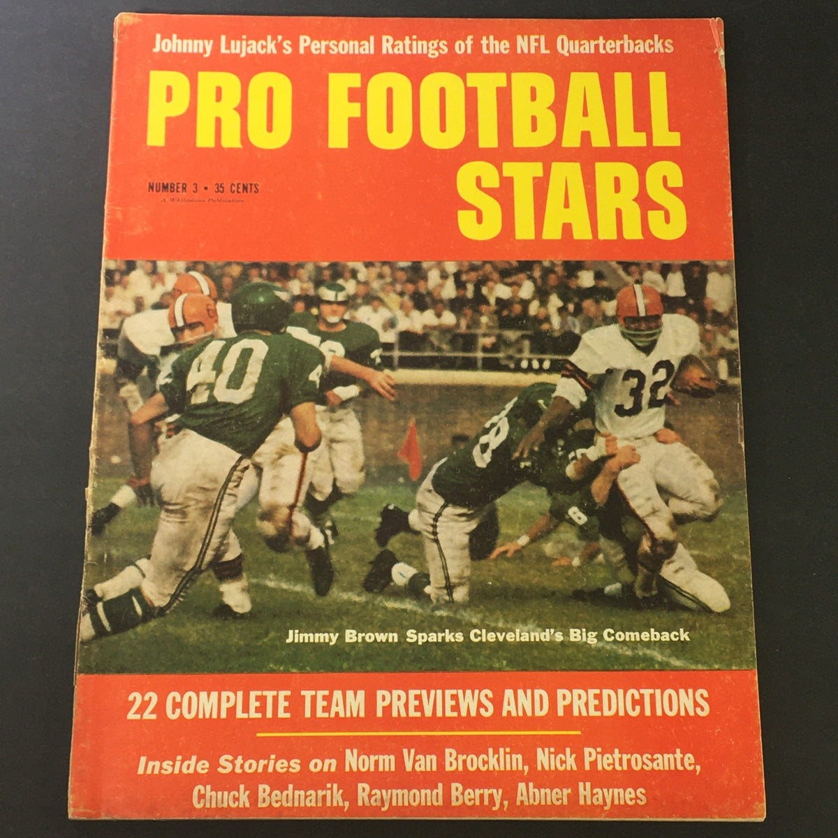 Cover of VTG Pro Football Stars Magazine 1961 featuring Jimmy Brown and Johnny Lujack, showcasing 'Pro Football Stars' with bold colors and imagery of a football game.