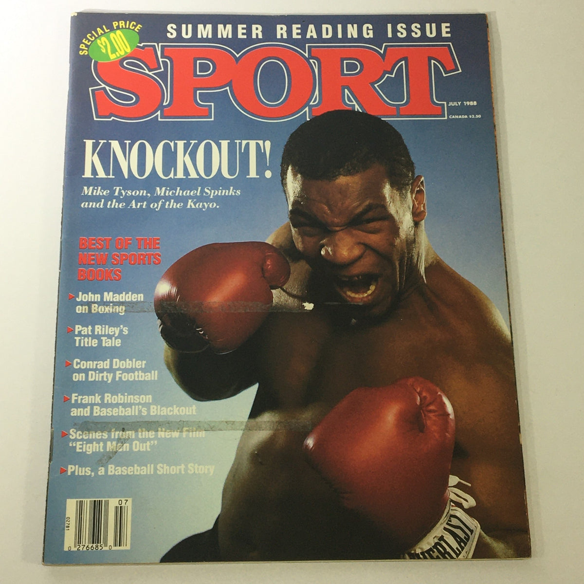 Cover of VTG Sport Magazine July 1988 featuring Mike Tyson and Michael Spinks with the headline 'KNOCKOUT! Mike Tyson, Michael Spinks and the Art of the Kayo'. The cover illustrates Tyson in boxing gloves, capturing the excitement of the heavyweight boxing rivalry.