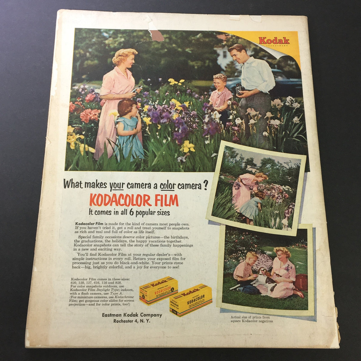Back cover of The Saturday Evening Post April 10, 1951 featuring a Kodak film advertisement with a family among flowers.