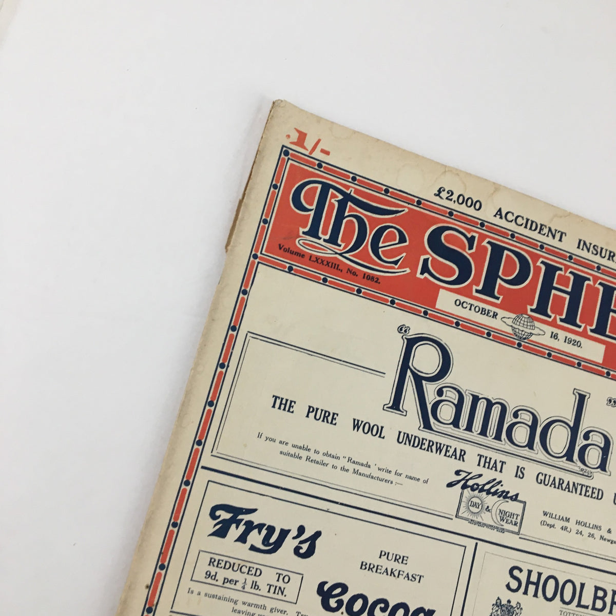 Close-up view of The Sphere Newspaper from October 16, 1920, presenting the title and a detailed advertisement.