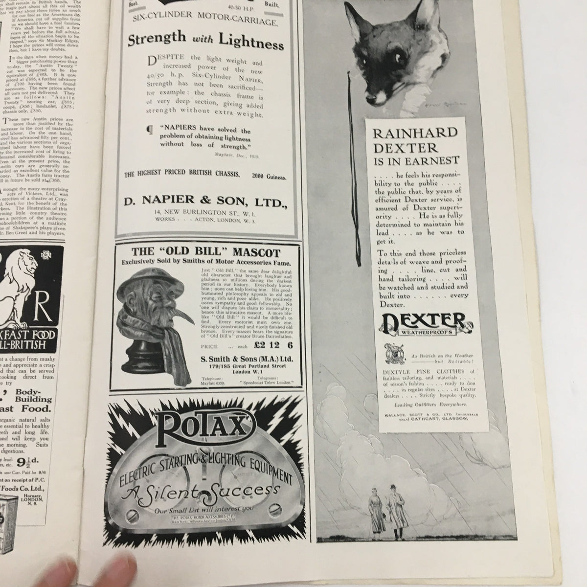 An advertisement page from The Sphere Newspaper May 1, 1920, featuring products like the 'Old Bill' mascot and motor carriage offerings.