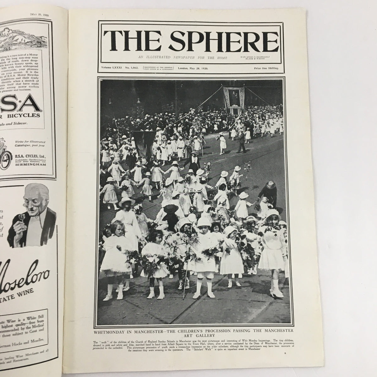 The Sphere Newspaper dated May 29, 1920, displaying a cover image of The Children's Procession Passing Manchester, illustrating children in white dresses holding flowers in a historic parade.