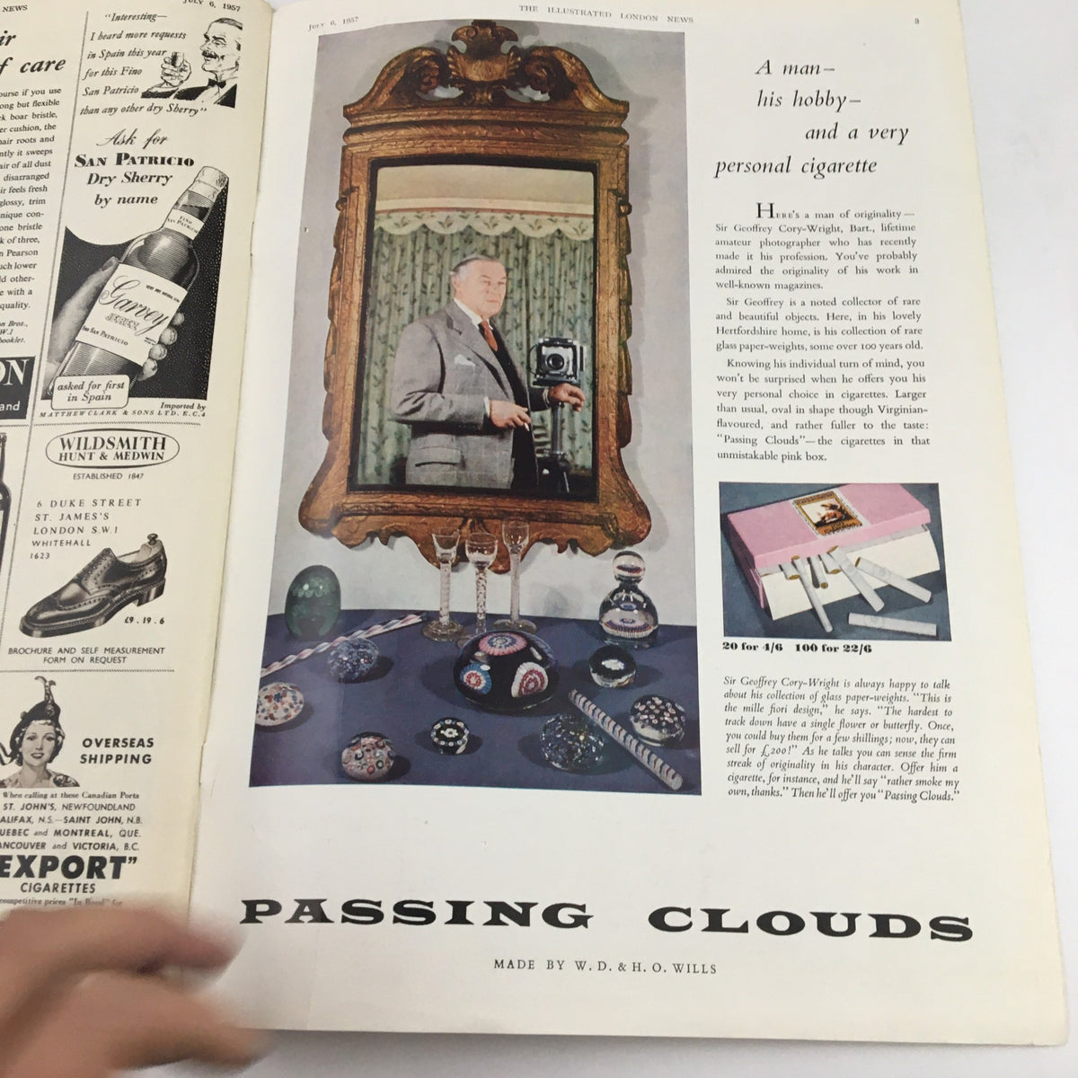 The Illustrated London News July 6, 1957, featuring an advertisement for 'Passing Clouds' cigarettes, showcasing a man posing with a vintage mirror and decorative objects, highlighting historical themes.