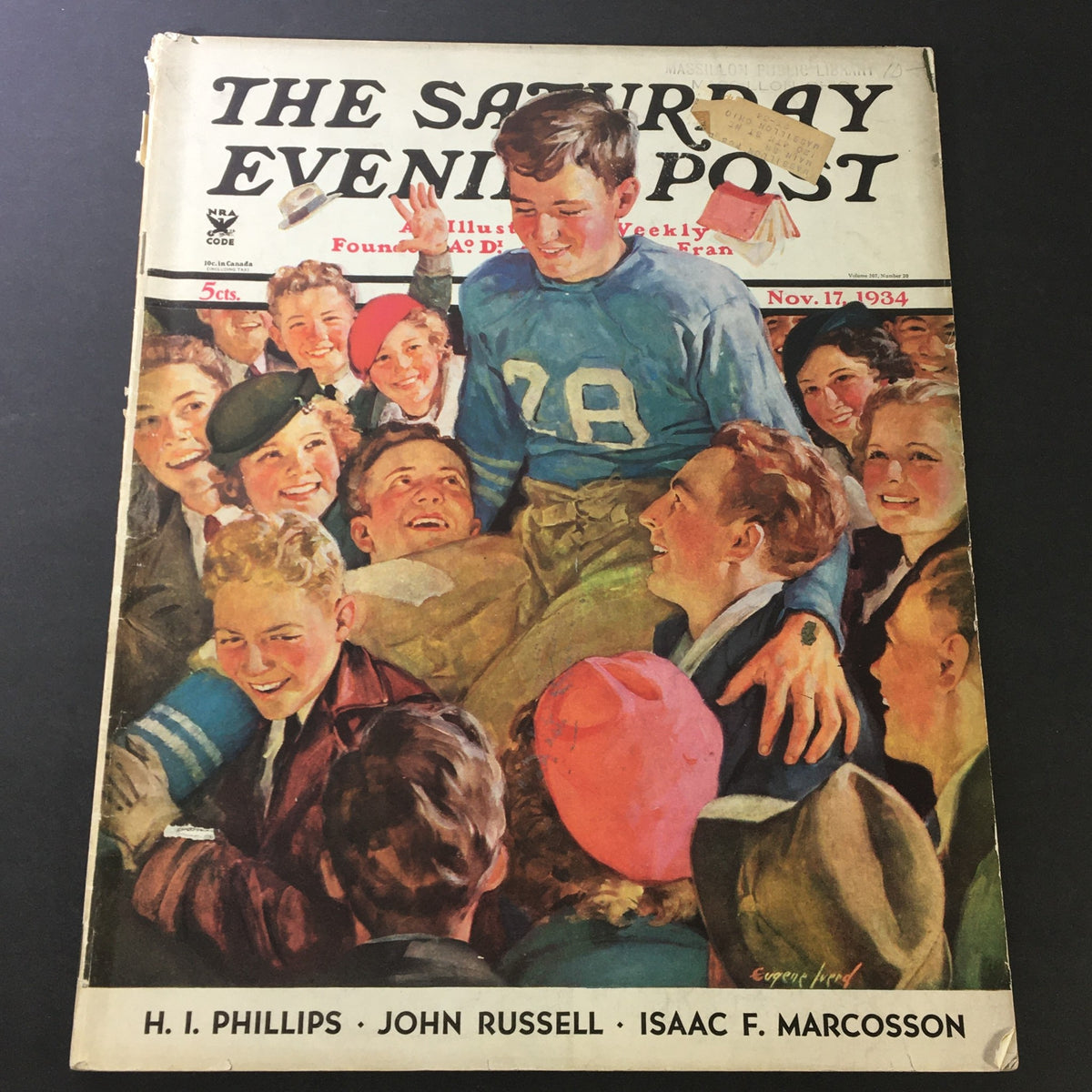 Cover of VTG The Saturday Evening Post from November 17, 1934, featuring a joyful scene with smiling children and a young man in a blue jersey, showcasing vintage illustrations and nostalgic moments.
