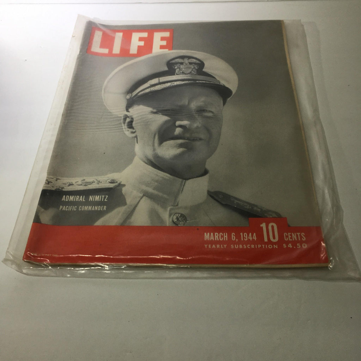 Life Magazine cover from March 6, 1944 featuring Admiral Nimitz, Pacific Commander. The iconic vintage magazine includes historical significance and is preserved in protective covering.