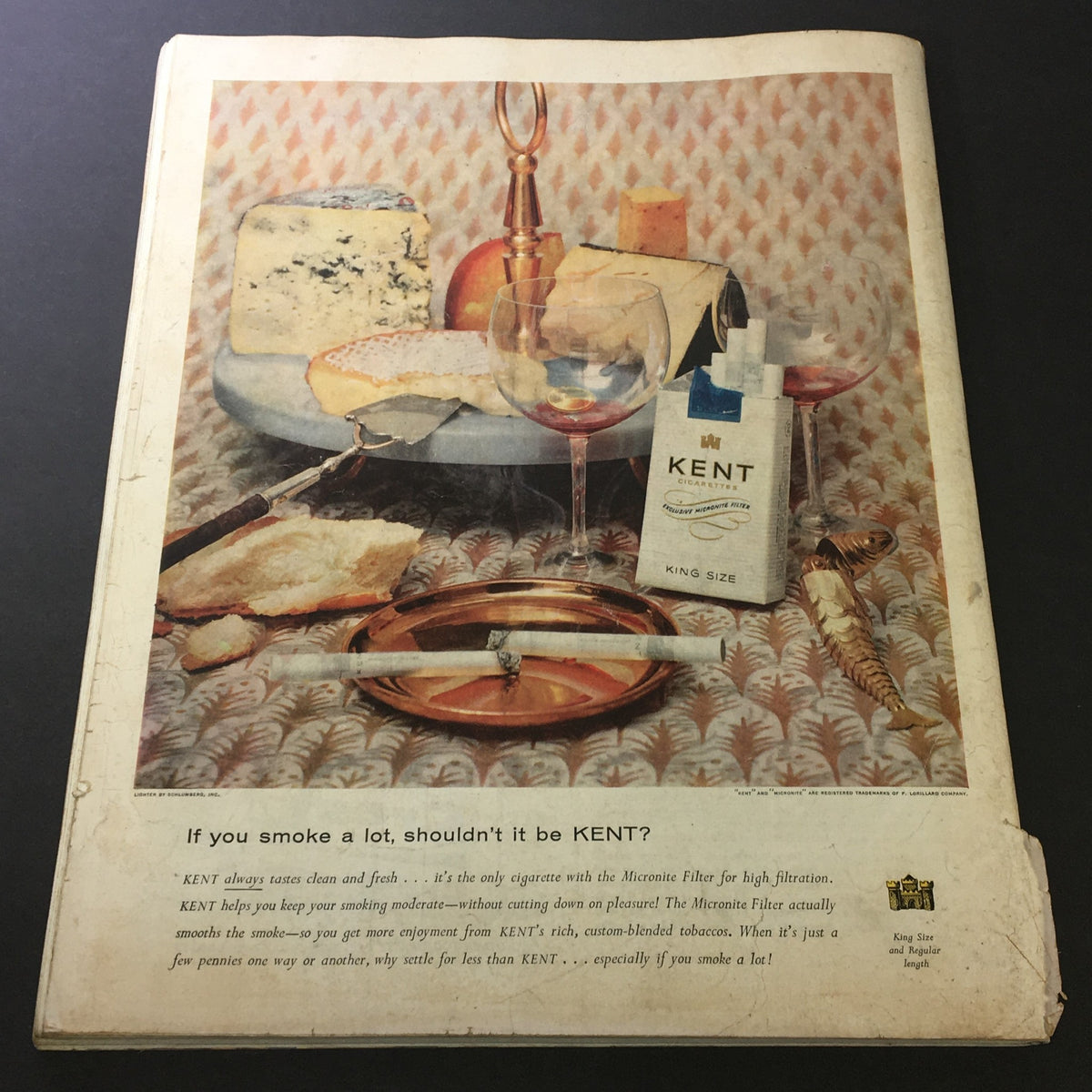 Back cover of the Saturday Evening Post April 14, 1956 featuring a KENT cigarettes advertisement with a styled cheese and wine display.