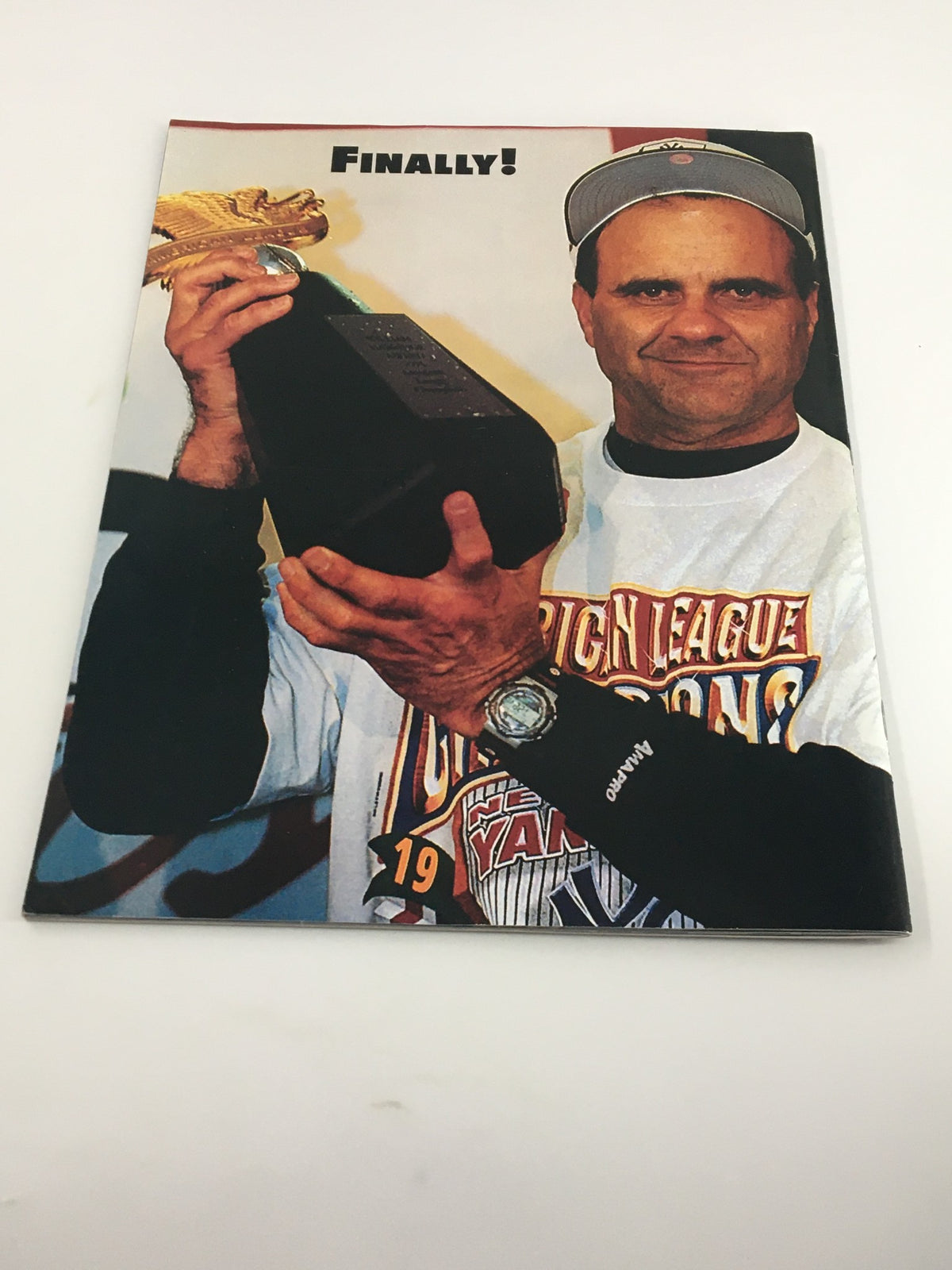 Cover of the 1996 Gold Collectors Series Magazine showing a successful moment for Yankees manager Joe Torre, celebrating a championship victory.