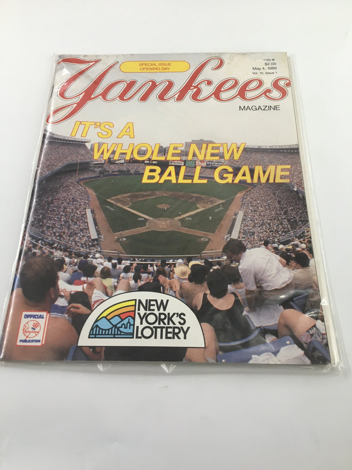 Vintage Yankees Magazine from May 4, 1989, featuring an image of Yankee Stadium filled with fans. The cover prominently displays the title 'Yankees Magazine' with the slogan 'IT'S A WHOLE NEW BALL GAME' and the New York's Lottery logo, making this a significant collectible for baseball enthusiasts.