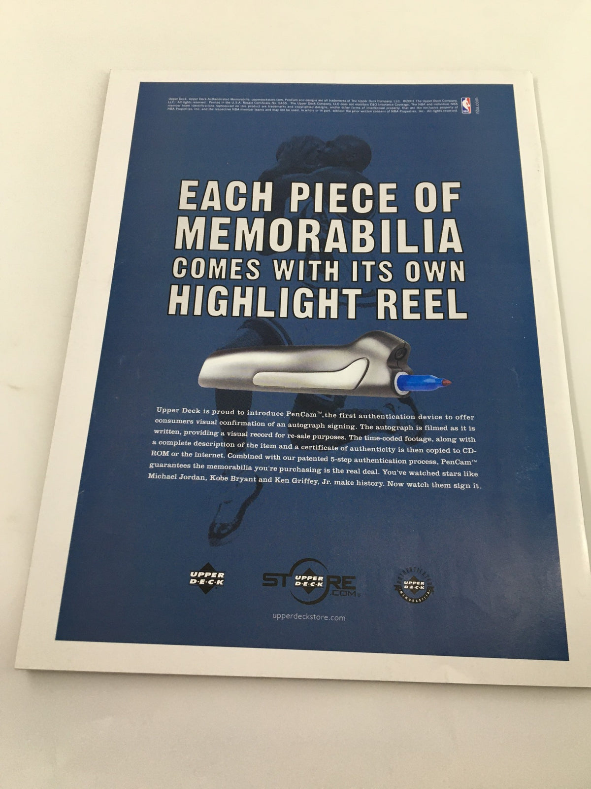 Back cover of Beckett Sports Collectibles February 2002 magazine promoting memorabilia with a highlight reel, highlighting the importance of authentic collectibles.