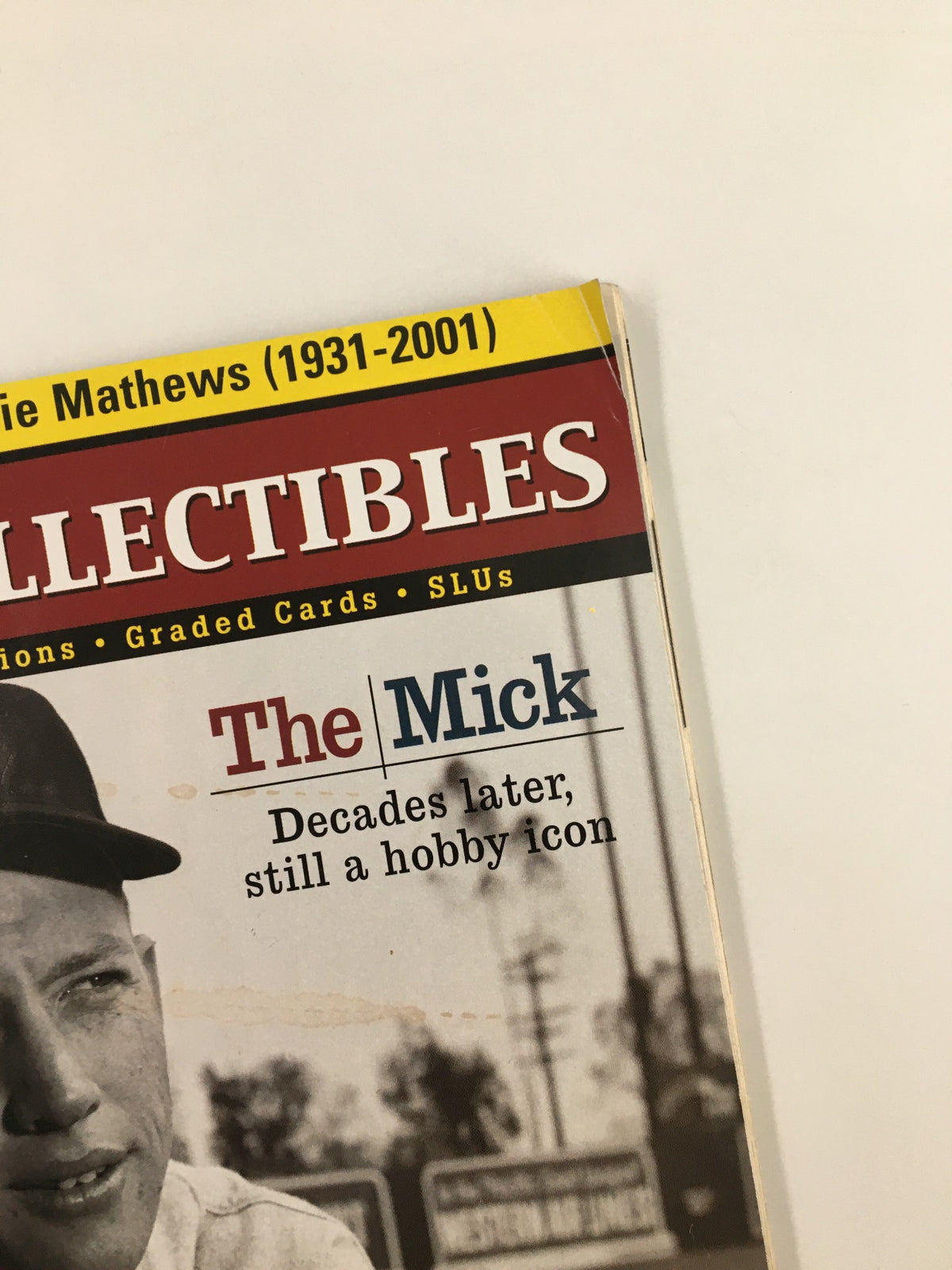 Close-up view of the Beckett Sports Collectibles April 2001 magazine cover highlighting Mickey Mantle with the text 'The Mick: Decades later, still a hobby icon', alongside a tribute to Eddie Mathews.