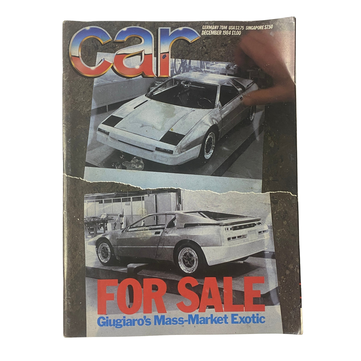 Cover of Car Magazine UK Import December 1984 featuring Giugiaro's Mass-Market Exotic, showcasing a mid-engined sports car design with the headline 'FOR SALE'.