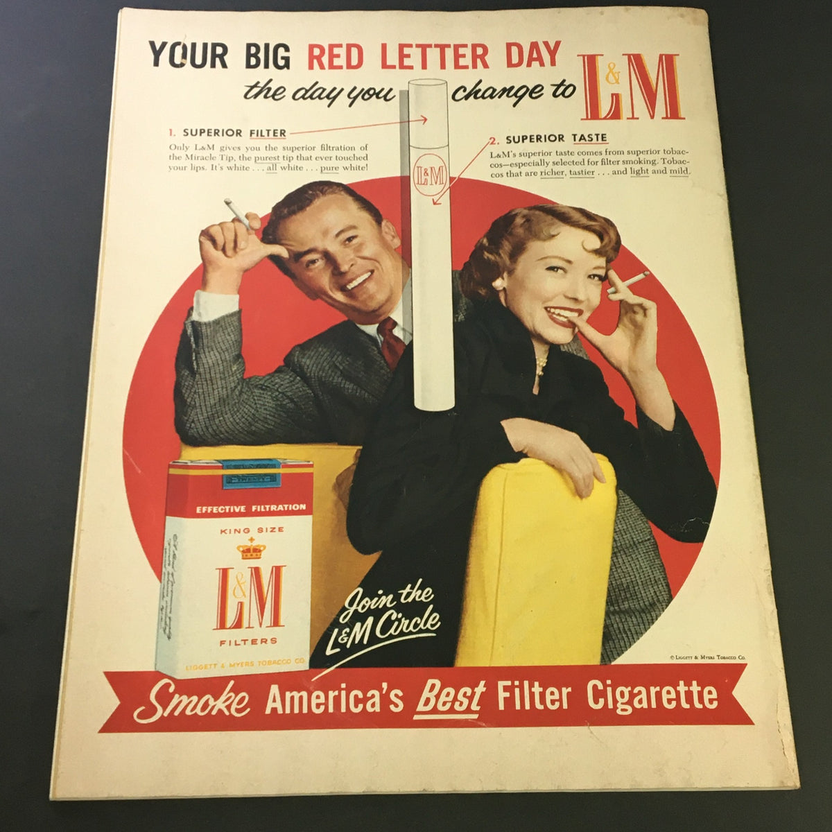 L&M cigarette advertisement featuring a smiling couple promoting L&M filters from VTG Collier's Magazine October 28 1955, emphasizing superior taste and quality.