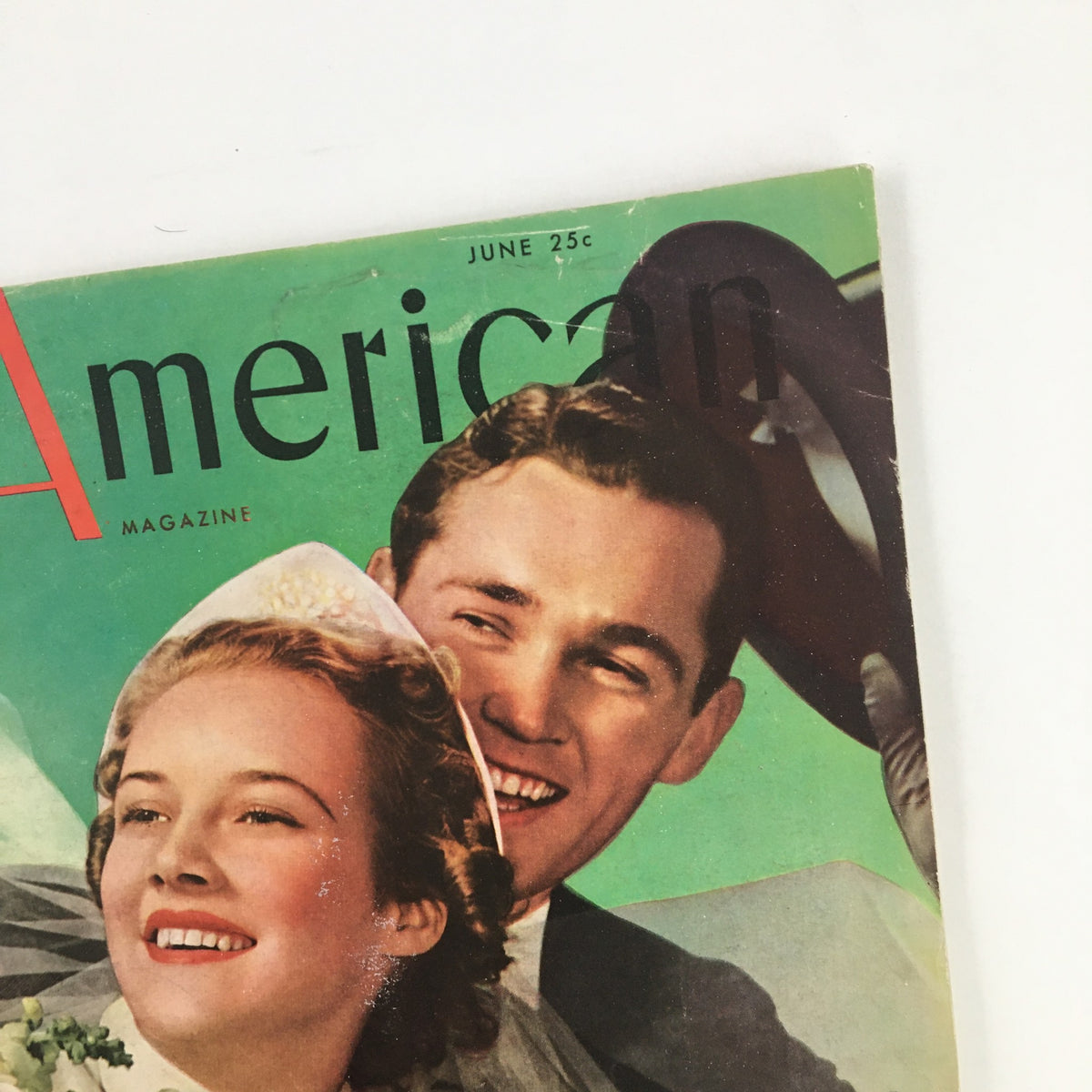 Detailed view of The American Magazine June 1937 cover, showcasing the title and images, featuring 'The Italian-Americans' article by William Searbook.