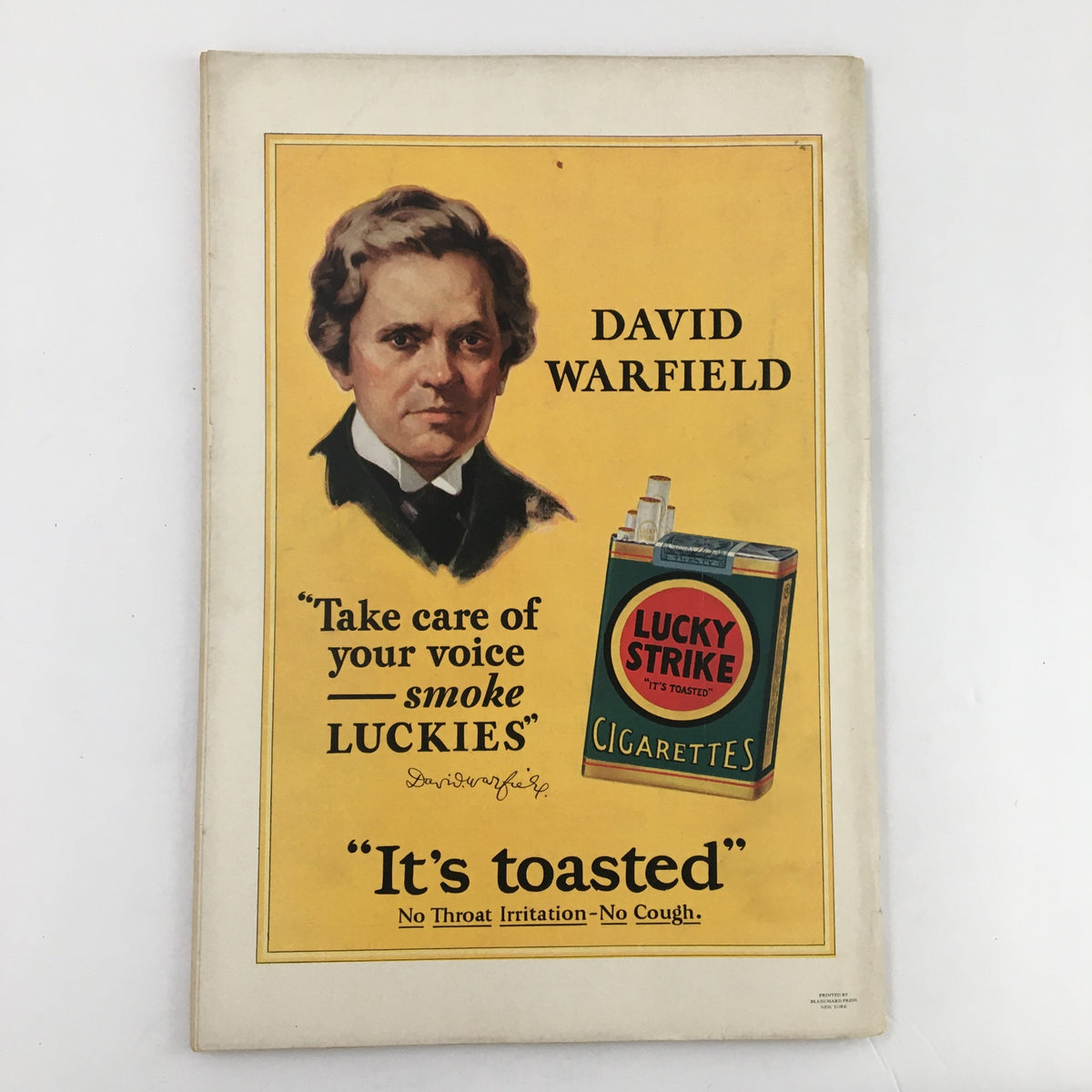 VTG The Spur Magazine January 15 1928 - A vintage advertisement featuring David Warfield promoting Lucky Strike cigarettes with a bright yellow background and portrait.