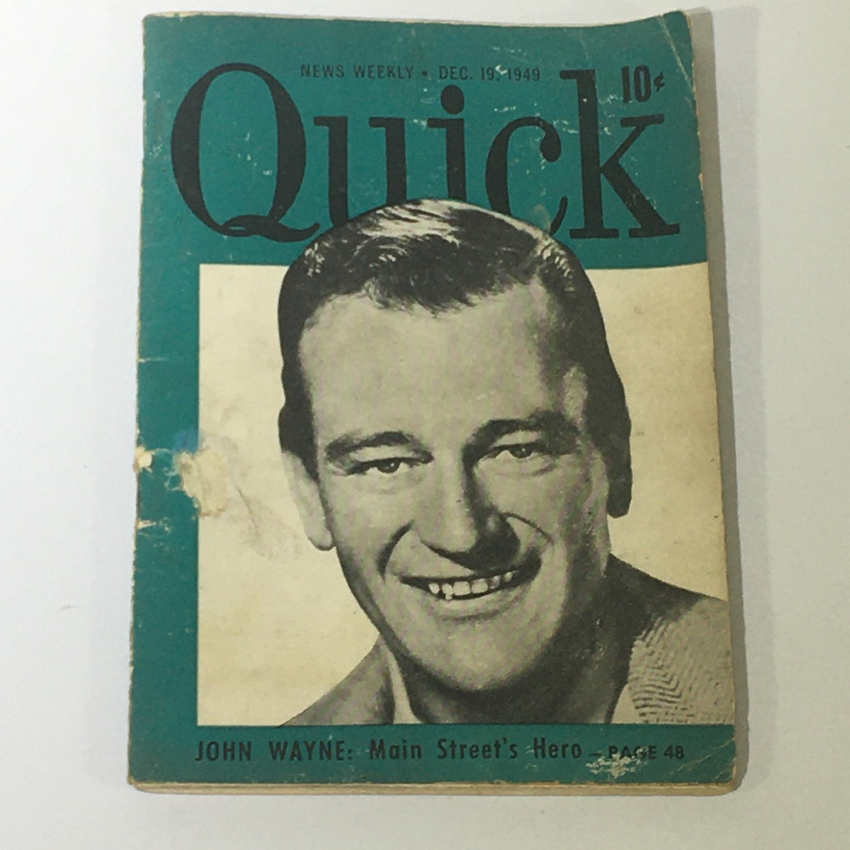 VTG Quick News Weekly December 9 1949, Volume 1, Issue #31 cover featuring John Wayne, showcasing a vintage magazine with historical significance.