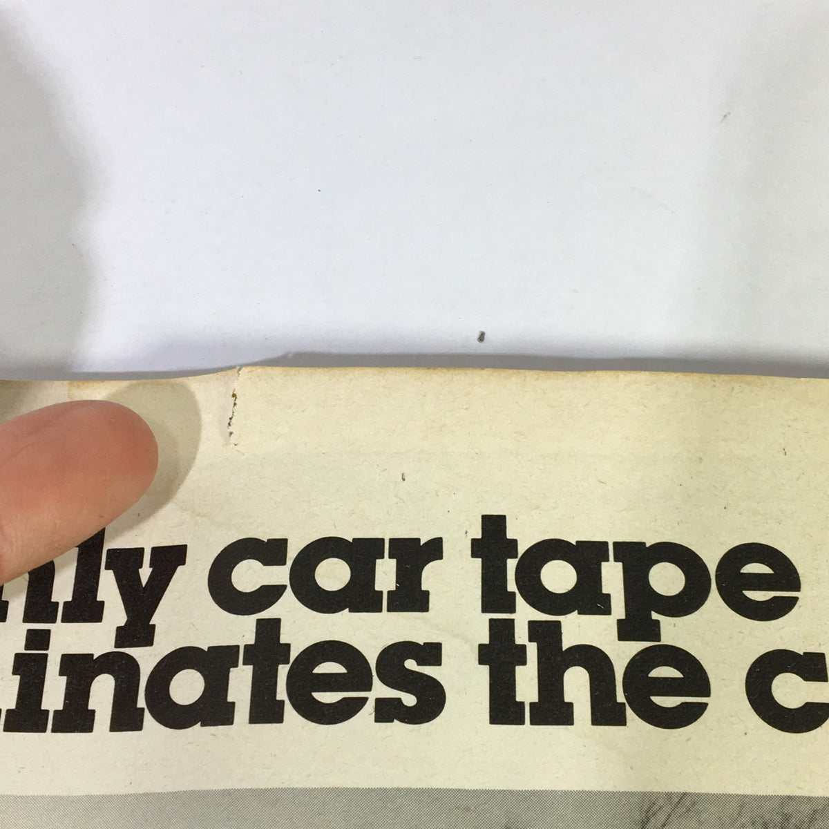 Close-up view of a page from the Vintage National Lampoon July 1980 magazine with an advertisement and visible edge wear.
