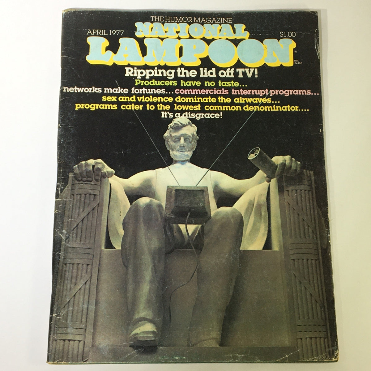 Cover of National Lampoon Magazine April 1977 featuring the Abraham Lincoln statue, highlighting the magazine's humorous critique of television.