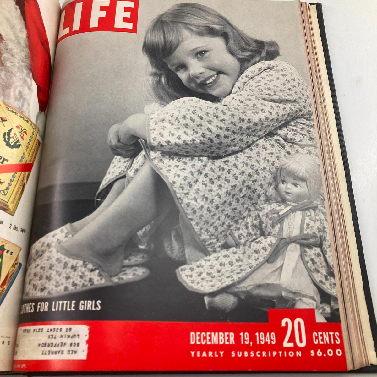 Cover of VTG 1949 Bound Life Magazine featuring a young girl smiling, showcasing 'Clothes for Little Girls' from the December 19, 1949 issue.