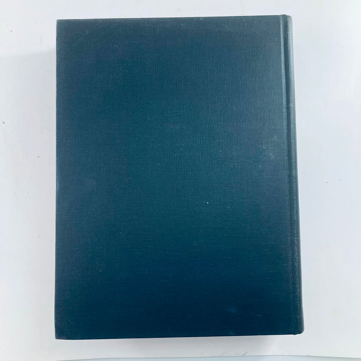 Side view of the vintage bound collection of VTG 1949 Life Magazine, showcasing its elegant dark cover.