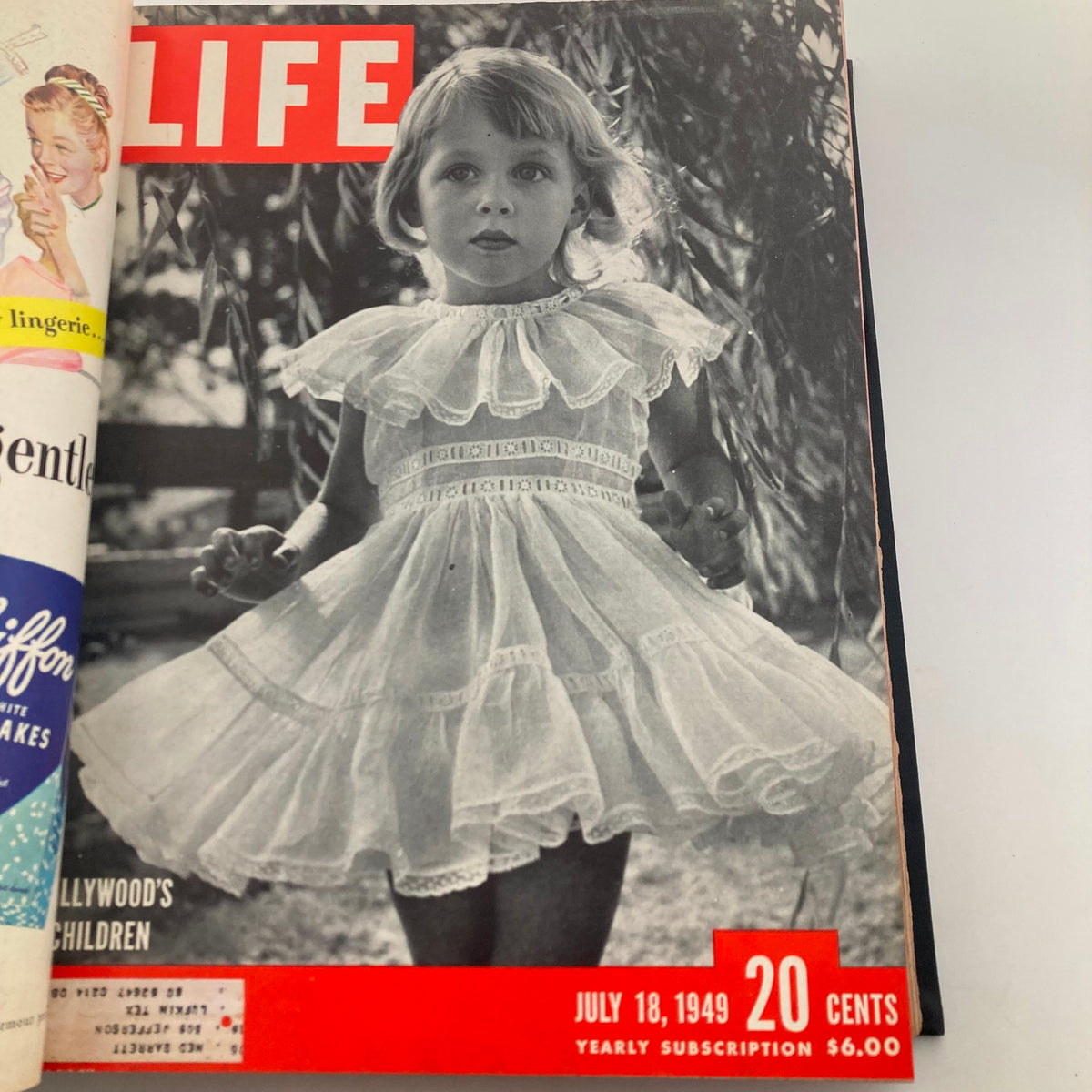 Cover of VTG 1949 Bound Life Magazine featuring a young girl in a white dress, July 18, 1949 issue, capturing the charm of childhood in vintage America.