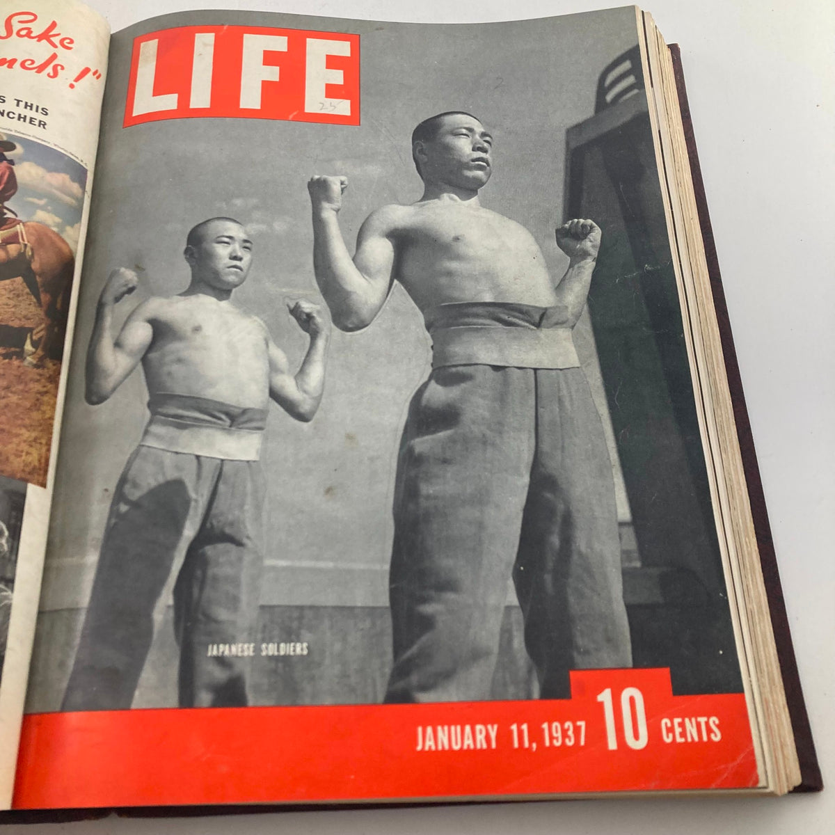 Cover of VTG 1936-1937 First Issue Bound Life Magazine depicting two Japanese soldiers flexing, January 11, 1937 edition.