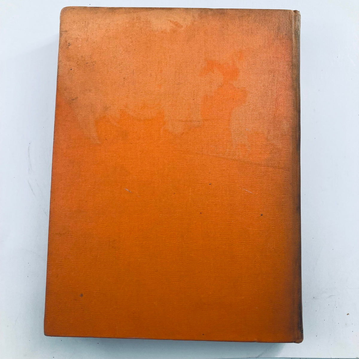 Spine view of Vintage 1939 Bound Life Magazine, showcasing the bound orange fabric cover, indicative of its vintage status.