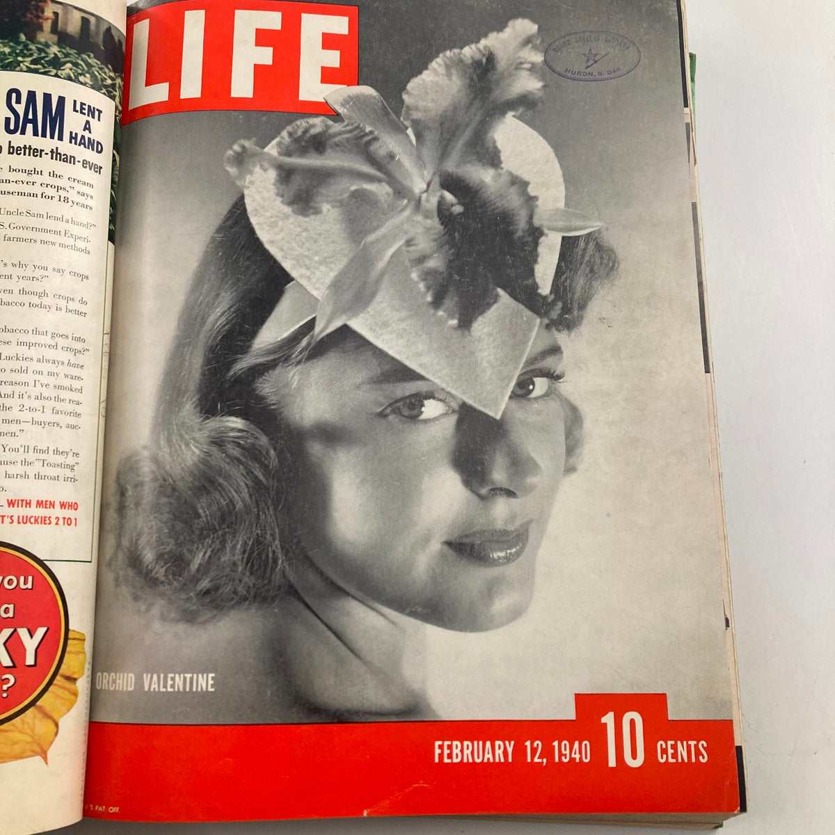 1940 Bound LIFE Magazine cover for February 12 featuring a woman with floral headwear, highlighting cultural fashion of the era.