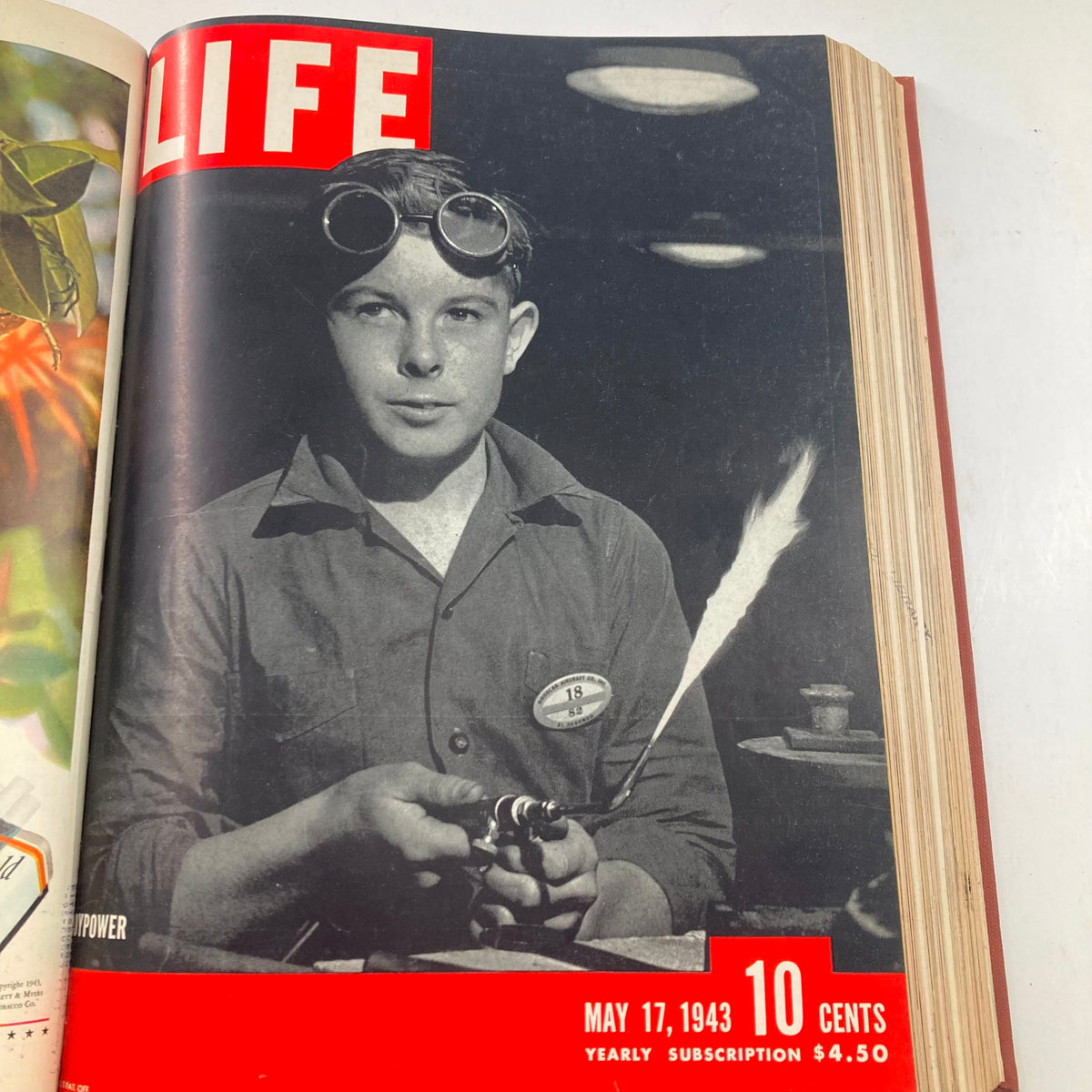 Cover of the VTG 1943 Bound Life Magazine showcasing a young boy working on machinery from May 17, 1943, depicting wartime industry efforts.