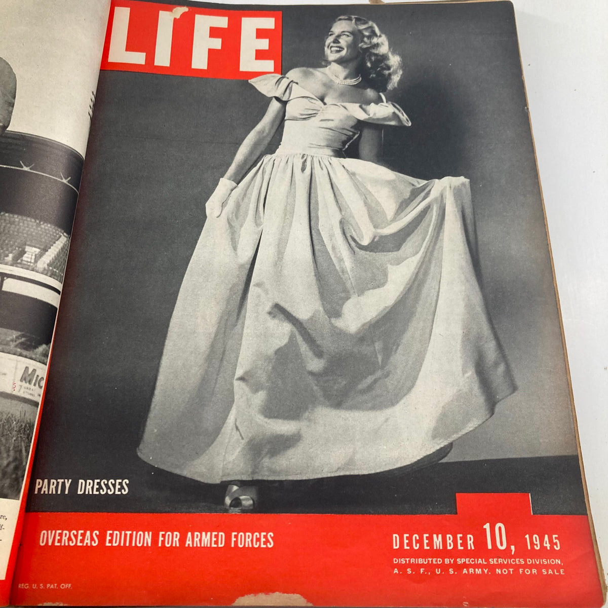 Cover of VTG 1945 Bound Life Magazine featuring glamorous party dresses, dated December 10, 1945, highlighting fashion trends of the time.