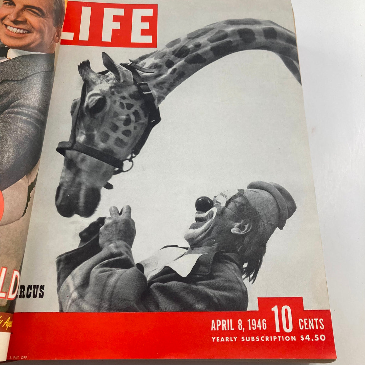 Cover of VTG 1946 Bound Life Magazine from April 8, 1946, depicting a clown interacting with a giraffe.