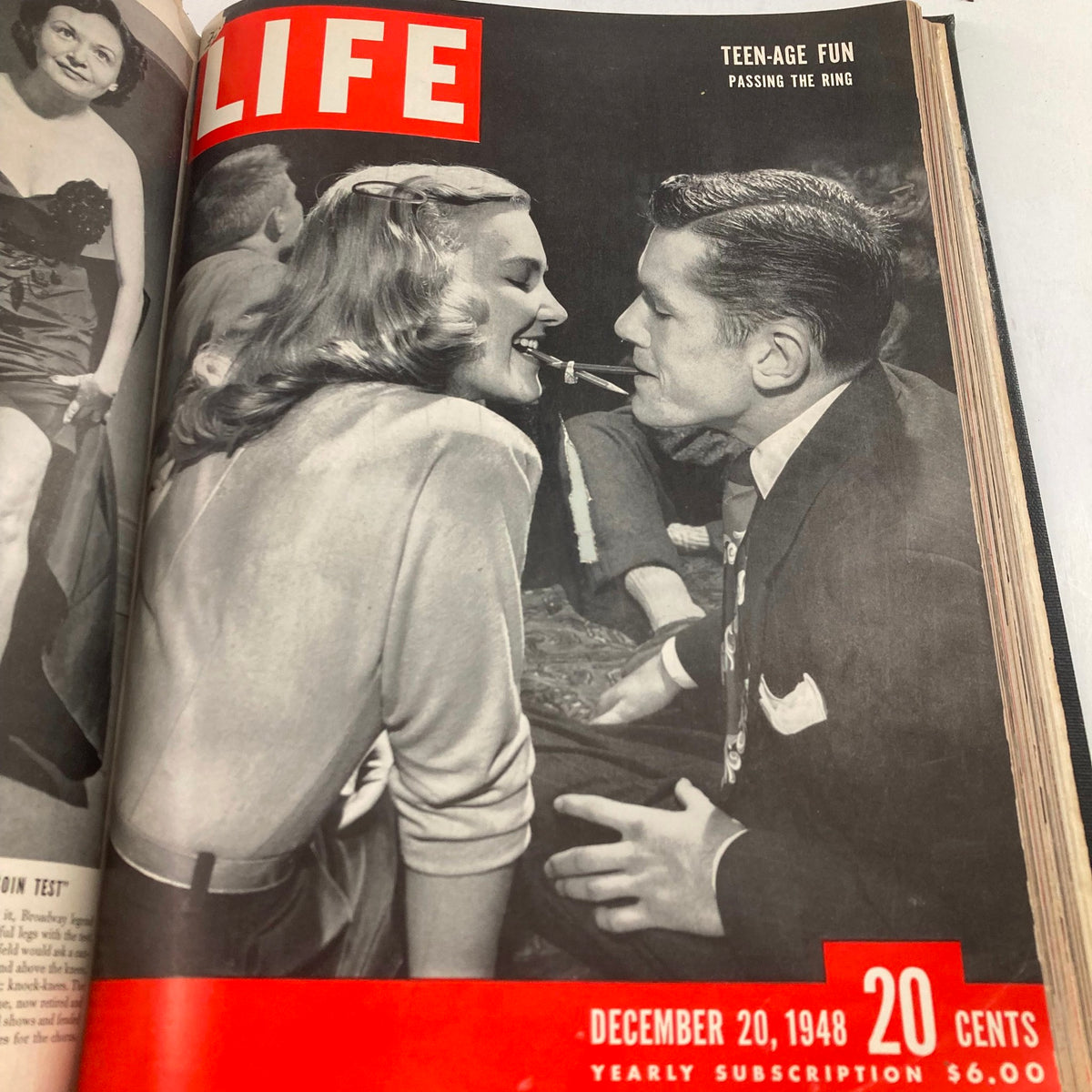 VTG 1948 Bound Life Magazine cover showing a couple enjoying a playful moment during a teen gathering, dated December 20, 1948.